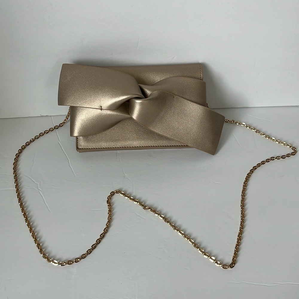 Gold bow purse